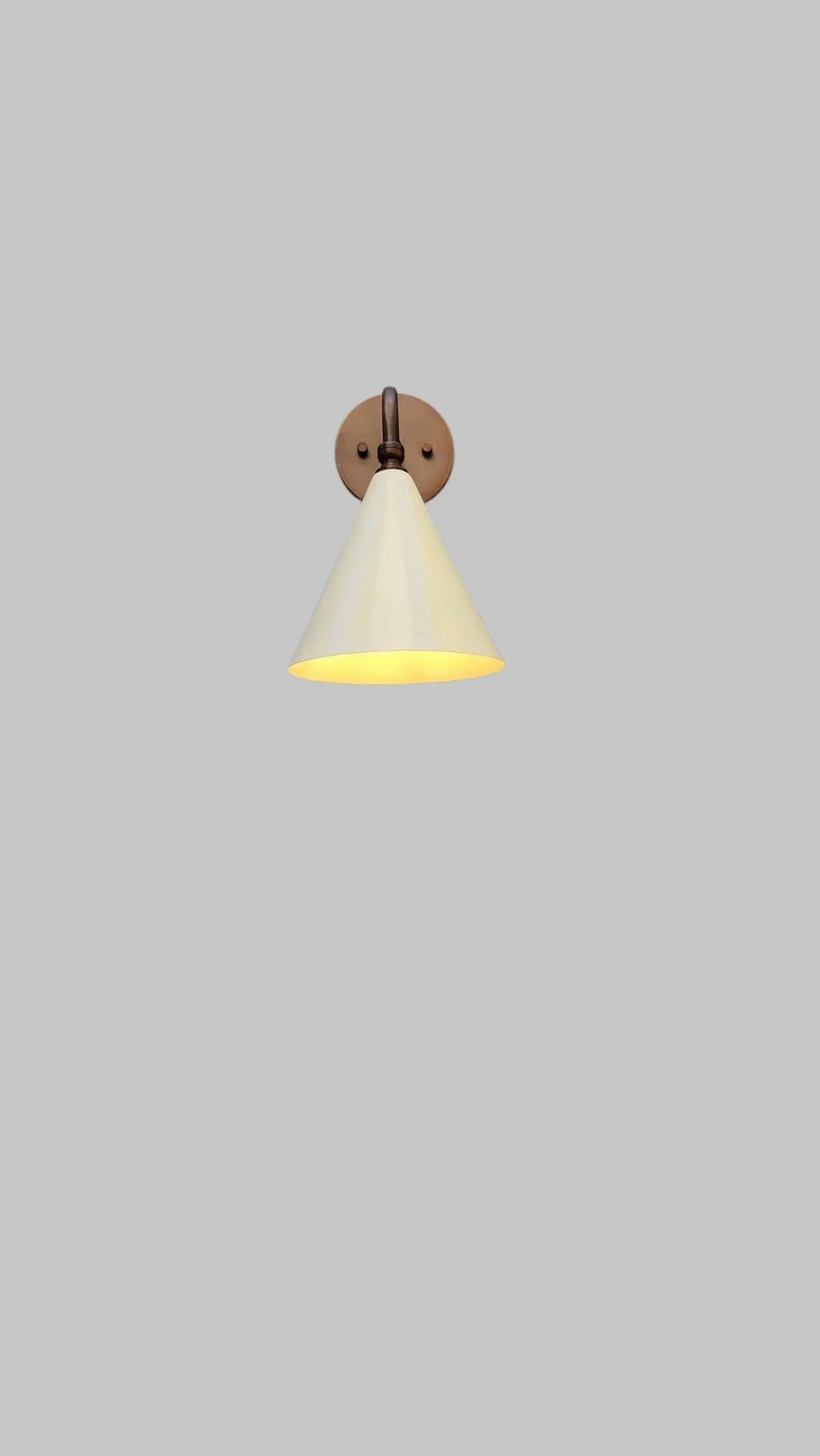 Handcrafted single Light Mid-Century brass wall lamp timeless elegance