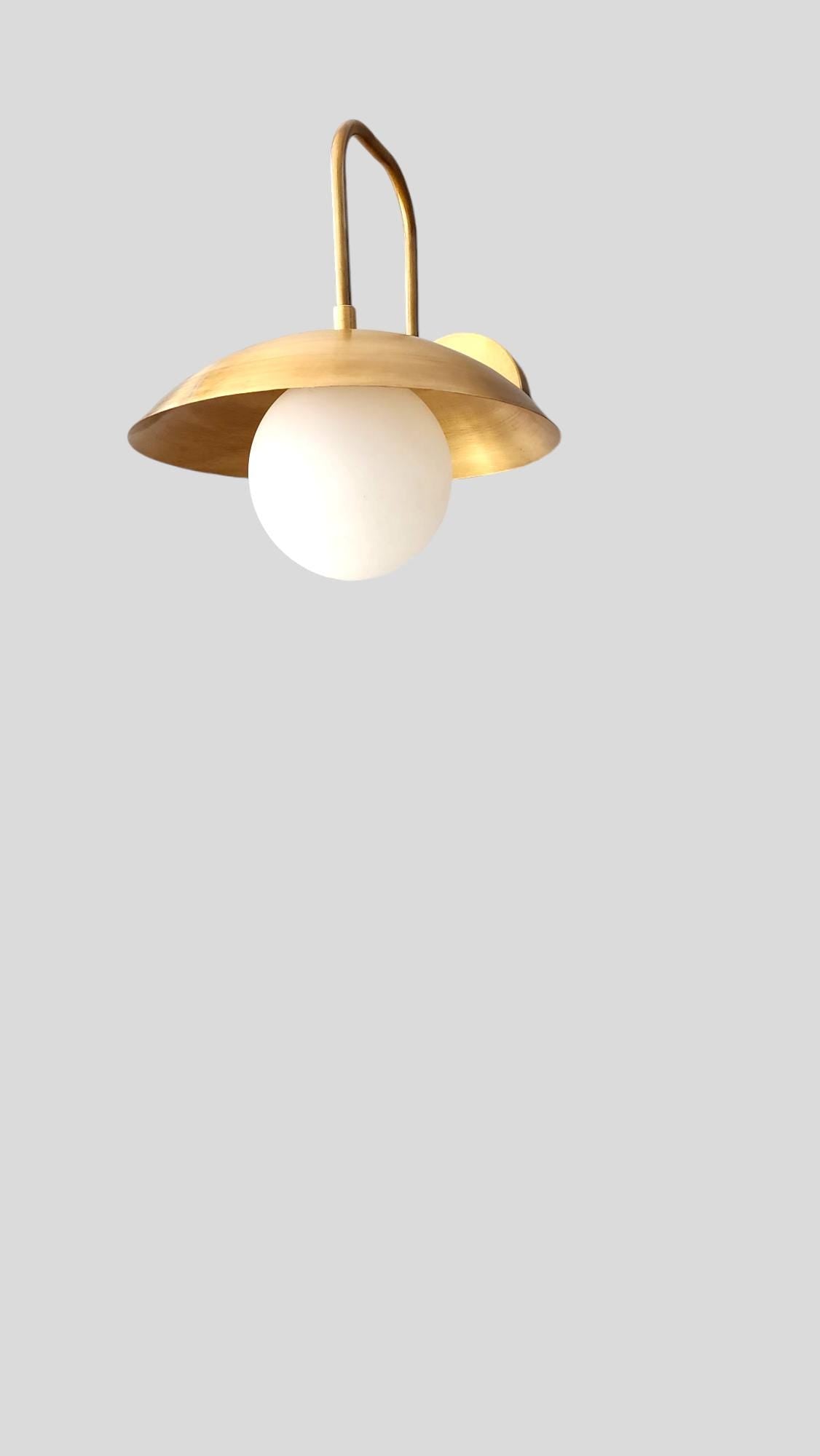 Handmade Curved Disk Shade Single light Mid-Century Raw Brass Wall Sconce