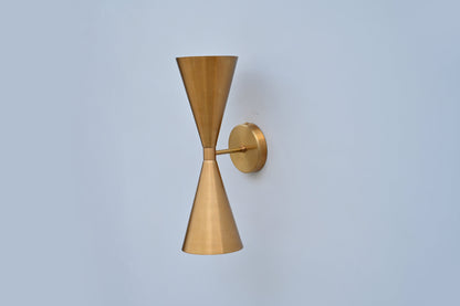 Mid-Century Modern Brass Wall Sconce with Upward and Downward Illumination, Handcrafted Light Ideal for Enhancing Any Interior Space