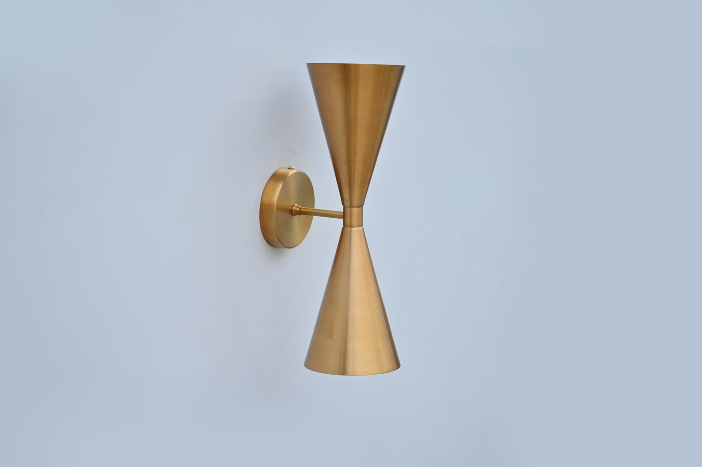 Mid-Century Modern Brass Wall Sconce with Upward and Downward Illumination, Handcrafted Light Ideal for Enhancing Any Interior Space