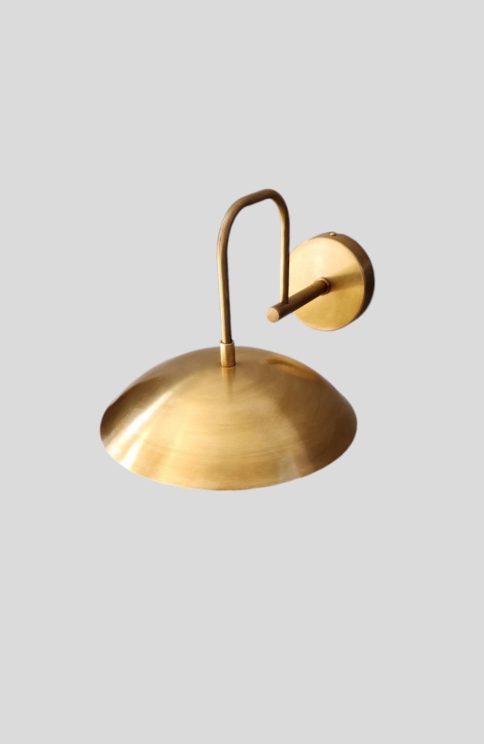 Handmade Curved Disk Shade Single light Mid-Century Raw Brass Wall Sconce