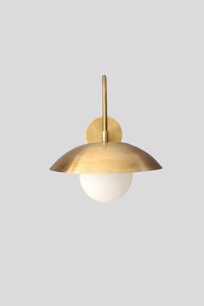Handmade Curved Disk Shade Single light Mid-Century Raw Brass Wall Sconce