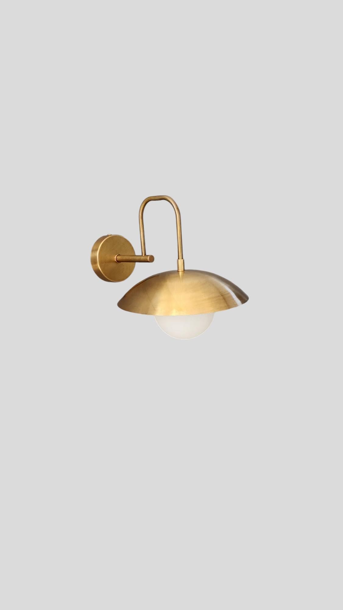 Handmade Curved Disk Shade Single light Mid-Century Raw Brass Wall Sconce