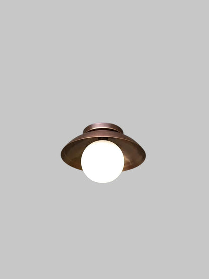 Handcrafted Single Light Raw Brass Italian Flush mount ceiling light fixture with frosted Glass Globe
