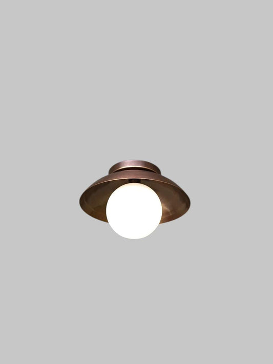 Handcrafted Single Light Raw Brass Italian Flush mount ceiling light fixture with frosted Glass Globe