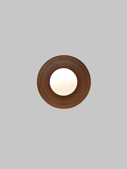 Handcrafted Single Light Raw Brass Italian Flush mount ceiling light fixture with frosted Glass Globe
