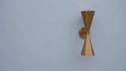 Mid-Century Modern Brass Wall Sconce with Upward and Downward Illumination, Handcrafted Light Ideal for Enhancing Any Interior Space